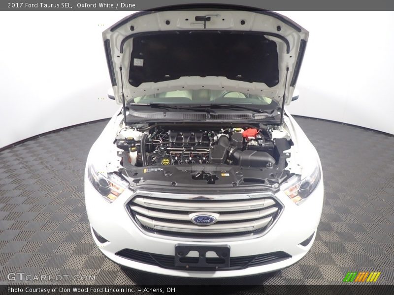 Oxford White / Dune 2017 Ford Taurus SEL