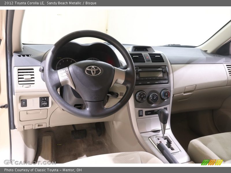 Sandy Beach Metallic / Bisque 2012 Toyota Corolla LE