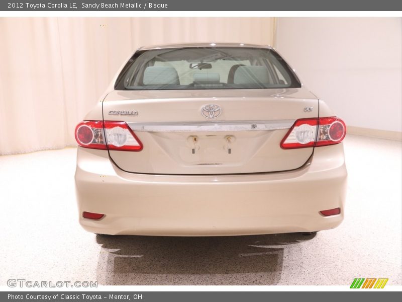 Sandy Beach Metallic / Bisque 2012 Toyota Corolla LE