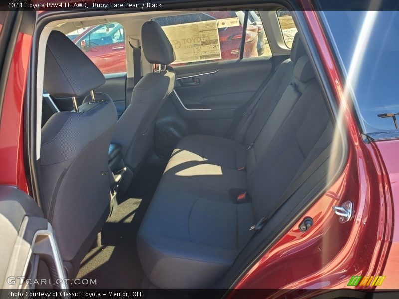 Ruby Flare Pearl / Black 2021 Toyota RAV4 LE AWD