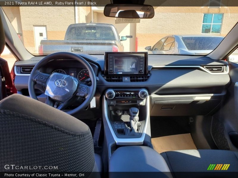 Ruby Flare Pearl / Black 2021 Toyota RAV4 LE AWD