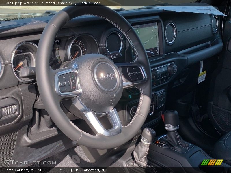 Black / Black 2021 Jeep Wrangler Unlimited Sahara 4x4