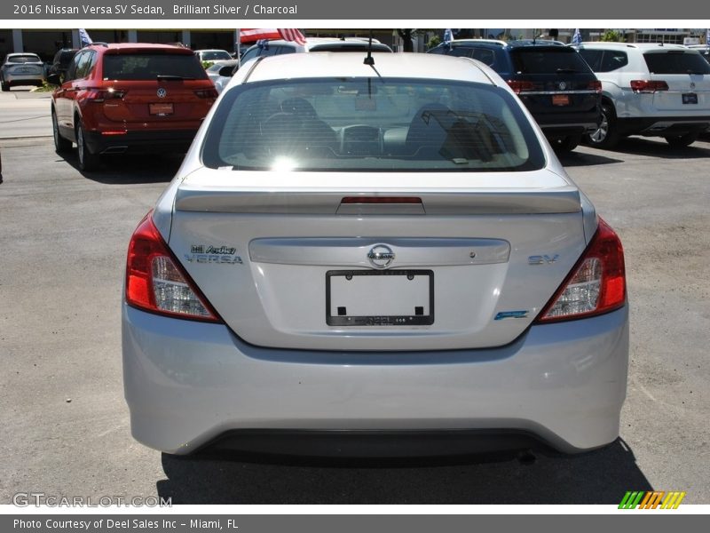 Brilliant Silver / Charcoal 2016 Nissan Versa SV Sedan
