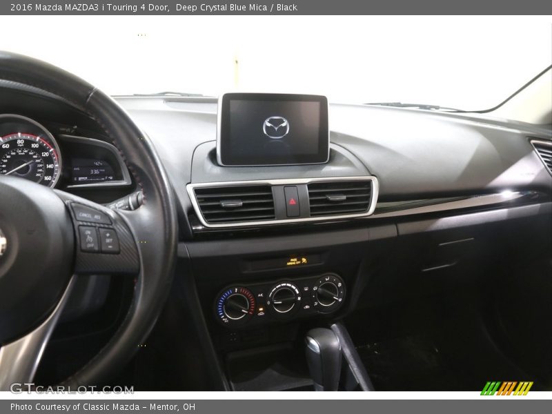 Deep Crystal Blue Mica / Black 2016 Mazda MAZDA3 i Touring 4 Door