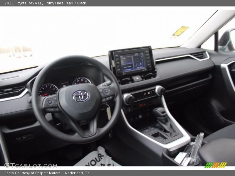 Ruby Flare Pearl / Black 2021 Toyota RAV4 LE