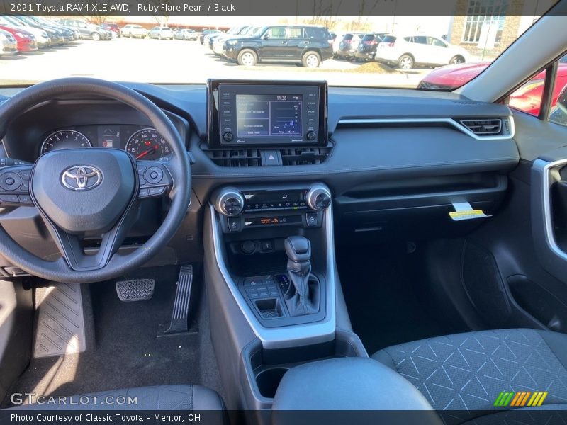Ruby Flare Pearl / Black 2021 Toyota RAV4 XLE AWD
