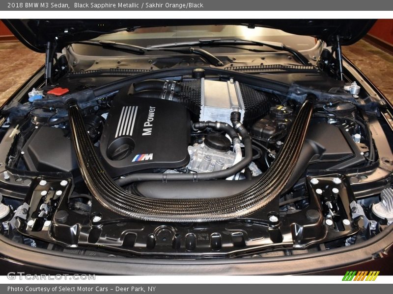 Black Sapphire Metallic / Sakhir Orange/Black 2018 BMW M3 Sedan