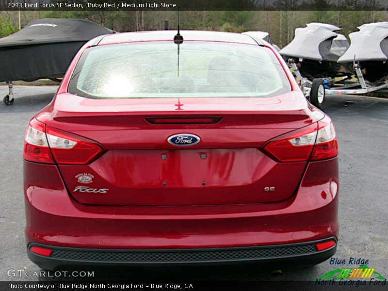 Ruby Red / Medium Light Stone 2013 Ford Focus SE Sedan