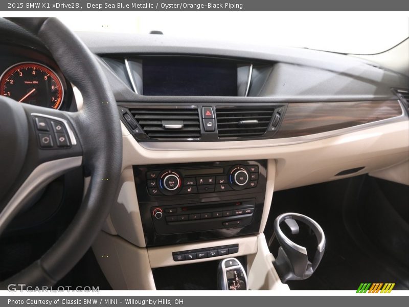 Deep Sea Blue Metallic / Oyster/Orange-Black Piping 2015 BMW X1 xDrive28i