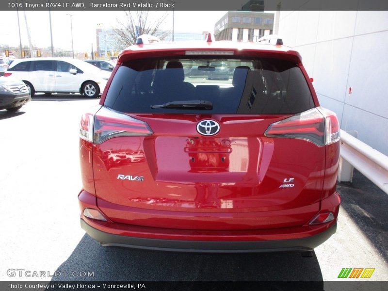 Barcelona Red Metallic / Black 2016 Toyota RAV4 LE AWD