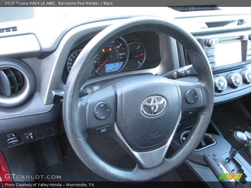 Barcelona Red Metallic / Black 2016 Toyota RAV4 LE AWD