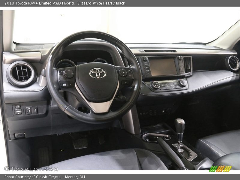 Blizzard White Pearl / Black 2018 Toyota RAV4 Limited AWD Hybrid
