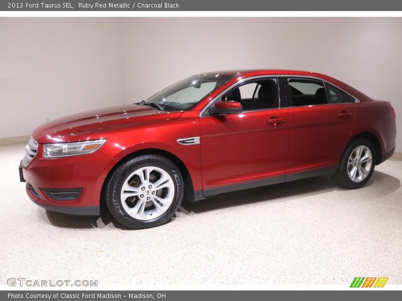 Ruby Red Metallic / Charcoal Black 2013 Ford Taurus SEL