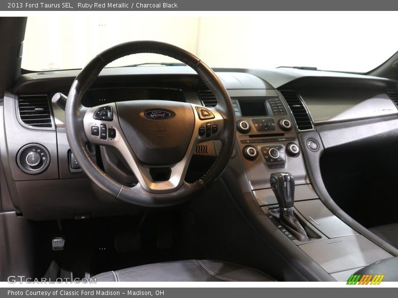 Ruby Red Metallic / Charcoal Black 2013 Ford Taurus SEL