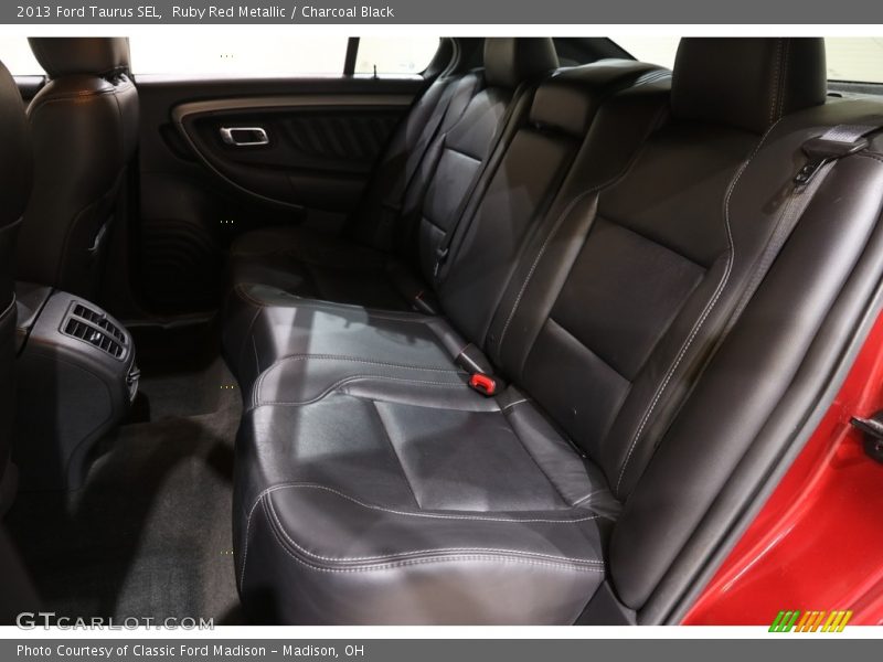 Ruby Red Metallic / Charcoal Black 2013 Ford Taurus SEL