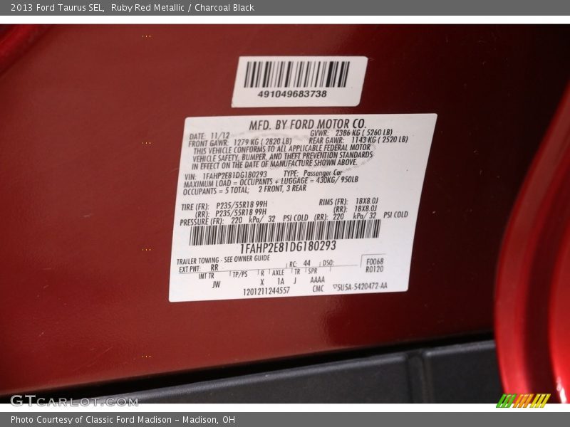 Ruby Red Metallic / Charcoal Black 2013 Ford Taurus SEL