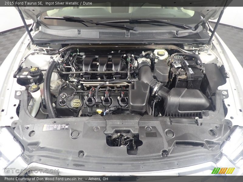 Ingot Silver Metallic / Dune 2015 Ford Taurus SE