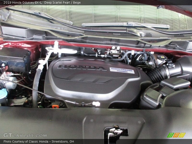 Deep Scarlet Pearl / Beige 2019 Honda Odyssey EX-L