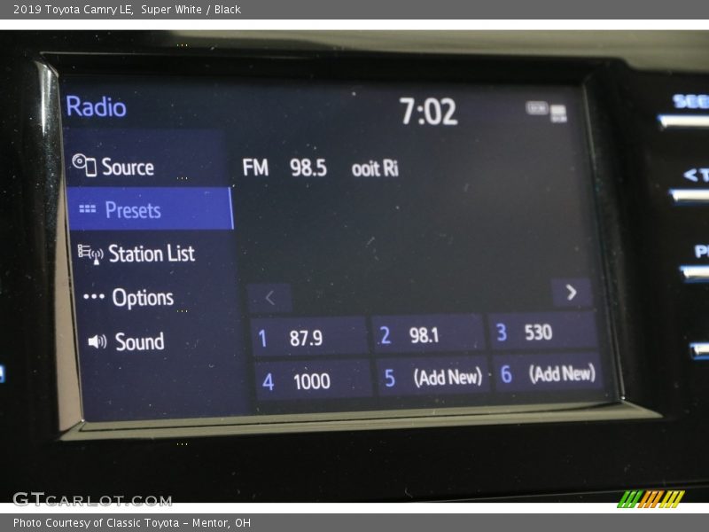 Super White / Black 2019 Toyota Camry LE