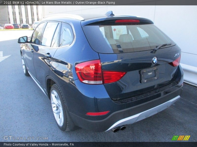 Le Mans Blue Metallic / Oyster/Orange-Black Piping 2015 BMW X1 xDrive28i