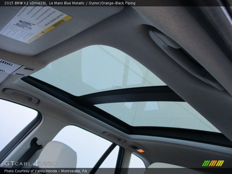 Le Mans Blue Metallic / Oyster/Orange-Black Piping 2015 BMW X1 xDrive28i