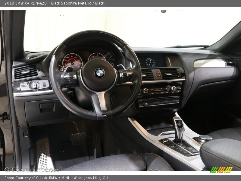 Black Sapphire Metallic / Black 2018 BMW X4 xDrive28i