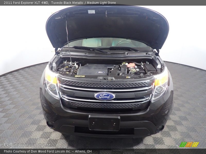 Tuxedo Black Metallic / Medium Light Stone 2011 Ford Explorer XLT 4WD
