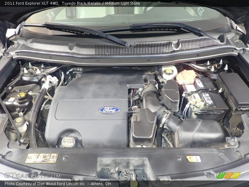 Tuxedo Black Metallic / Medium Light Stone 2011 Ford Explorer XLT 4WD