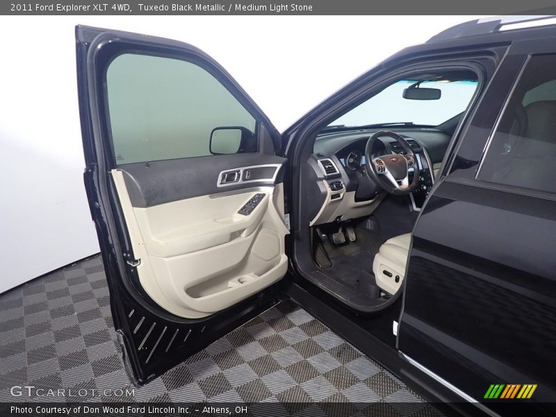 Tuxedo Black Metallic / Medium Light Stone 2011 Ford Explorer XLT 4WD