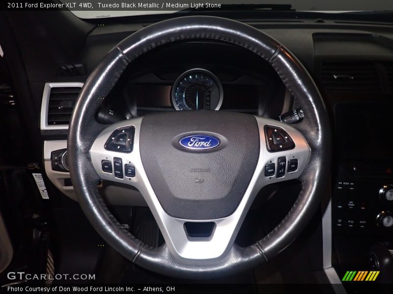 Tuxedo Black Metallic / Medium Light Stone 2011 Ford Explorer XLT 4WD