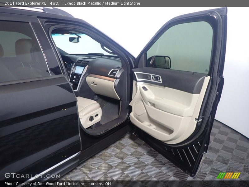 Tuxedo Black Metallic / Medium Light Stone 2011 Ford Explorer XLT 4WD