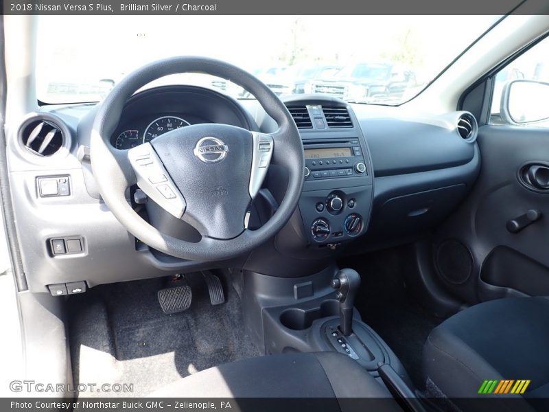 Brilliant Silver / Charcoal 2018 Nissan Versa S Plus