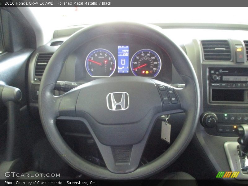 Polished Metal Metallic / Black 2010 Honda CR-V LX AWD