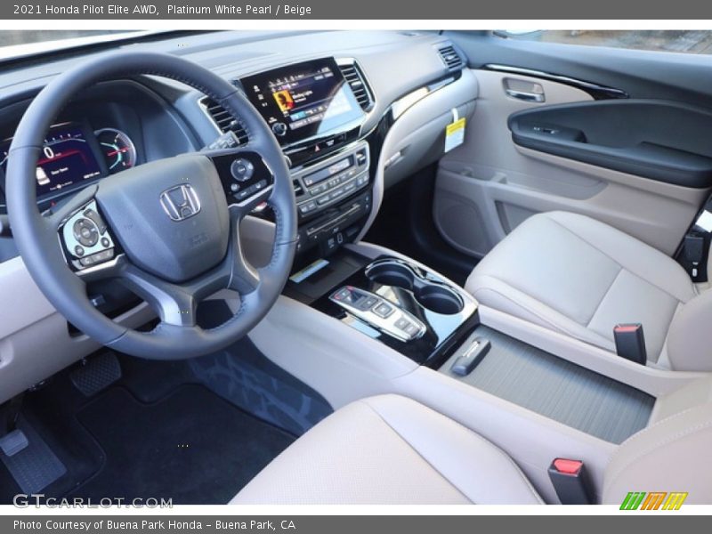 Platinum White Pearl / Beige 2021 Honda Pilot Elite AWD
