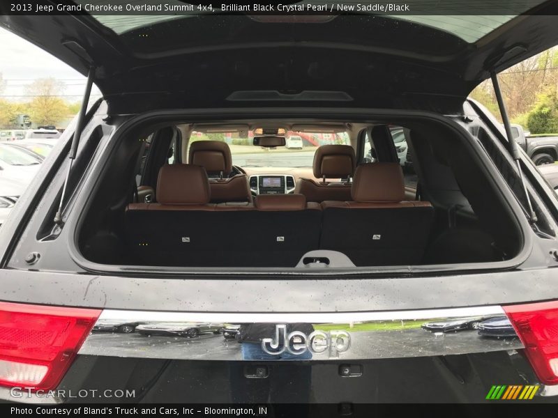 Brilliant Black Crystal Pearl / New Saddle/Black 2013 Jeep Grand Cherokee Overland Summit 4x4