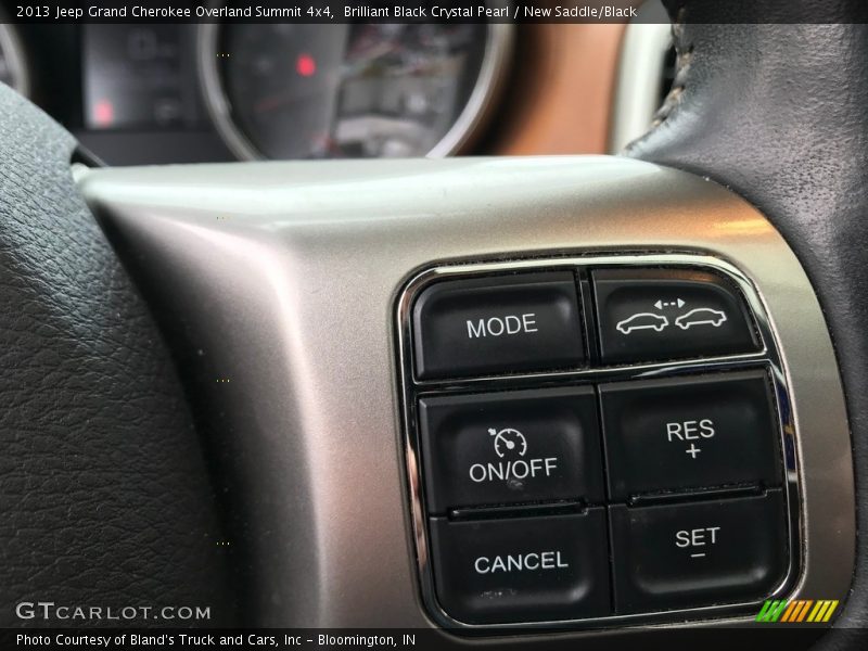 Brilliant Black Crystal Pearl / New Saddle/Black 2013 Jeep Grand Cherokee Overland Summit 4x4