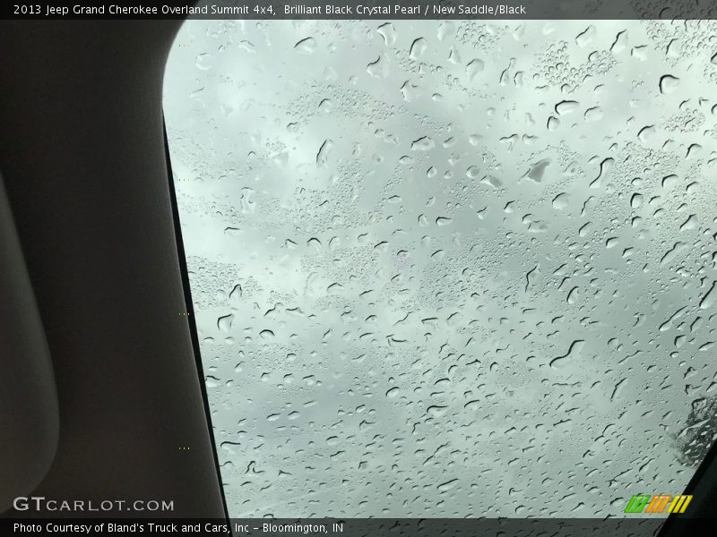 Brilliant Black Crystal Pearl / New Saddle/Black 2013 Jeep Grand Cherokee Overland Summit 4x4