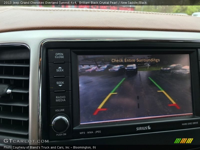 Brilliant Black Crystal Pearl / New Saddle/Black 2013 Jeep Grand Cherokee Overland Summit 4x4