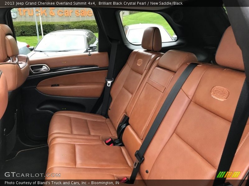 Brilliant Black Crystal Pearl / New Saddle/Black 2013 Jeep Grand Cherokee Overland Summit 4x4