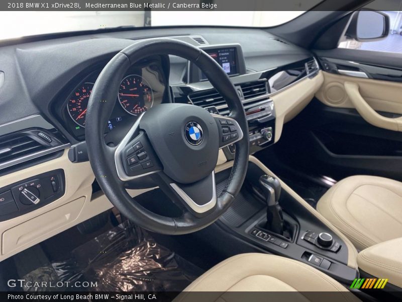 Mediterranean Blue Metallic / Canberra Beige 2018 BMW X1 xDrive28i