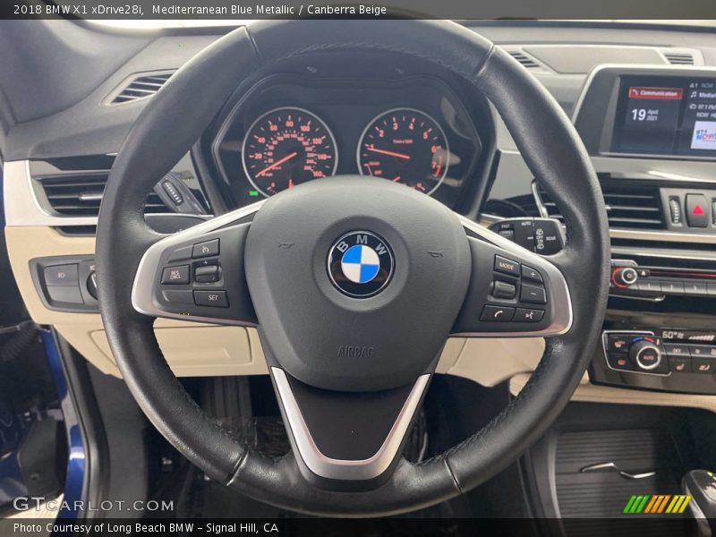 Mediterranean Blue Metallic / Canberra Beige 2018 BMW X1 xDrive28i