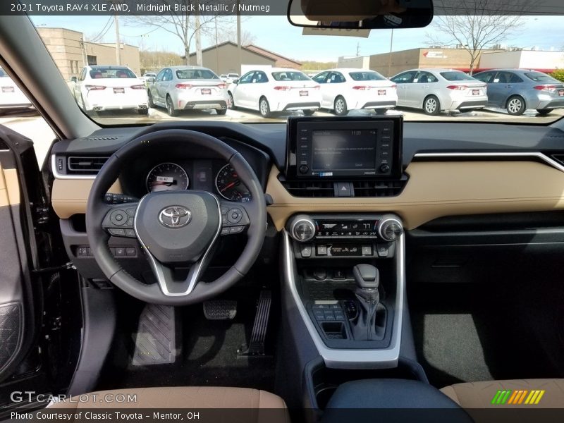 Midnight Black Metallic / Nutmeg 2021 Toyota RAV4 XLE AWD