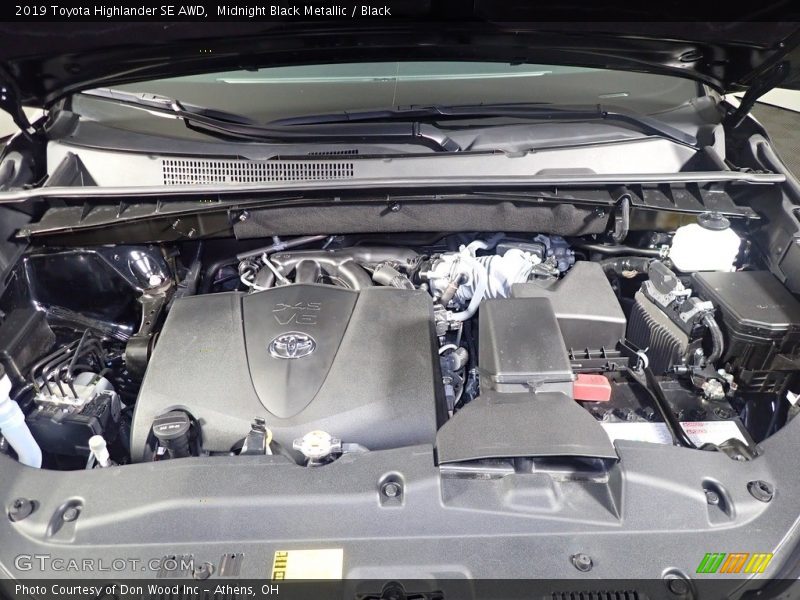 Midnight Black Metallic / Black 2019 Toyota Highlander SE AWD