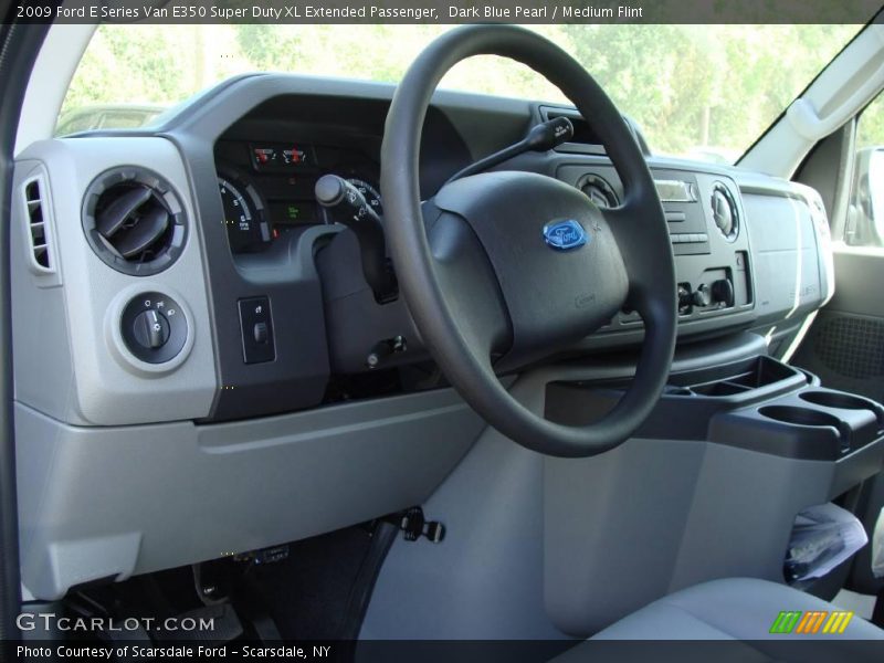 Dark Blue Pearl / Medium Flint 2009 Ford E Series Van E350 Super Duty XL Extended Passenger