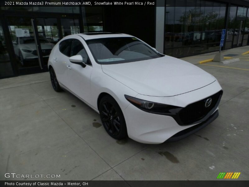 Snowflake White Pearl Mica / Red 2021 Mazda Mazda3 Premium Hatchback AWD