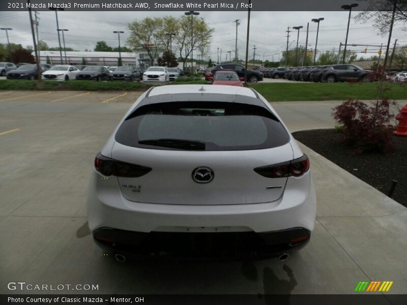 Snowflake White Pearl Mica / Red 2021 Mazda Mazda3 Premium Hatchback AWD