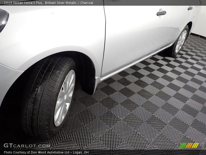 Brilliant Silver Metallic / Charcoal 2019 Nissan Versa S Plus