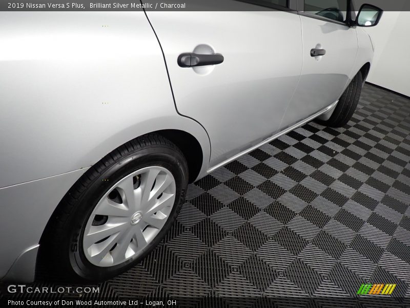 Brilliant Silver Metallic / Charcoal 2019 Nissan Versa S Plus