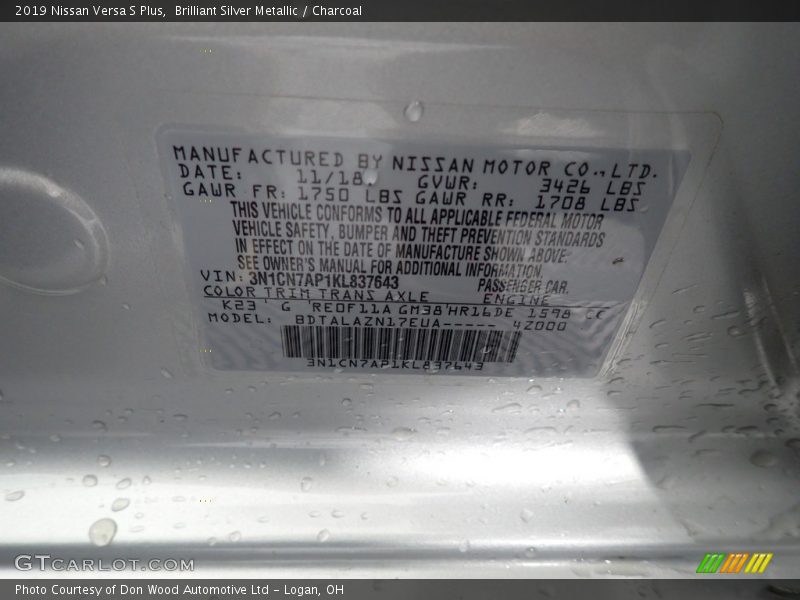 Brilliant Silver Metallic / Charcoal 2019 Nissan Versa S Plus