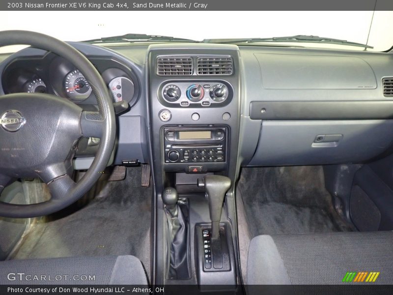 Dashboard of 2003 Frontier XE V6 King Cab 4x4